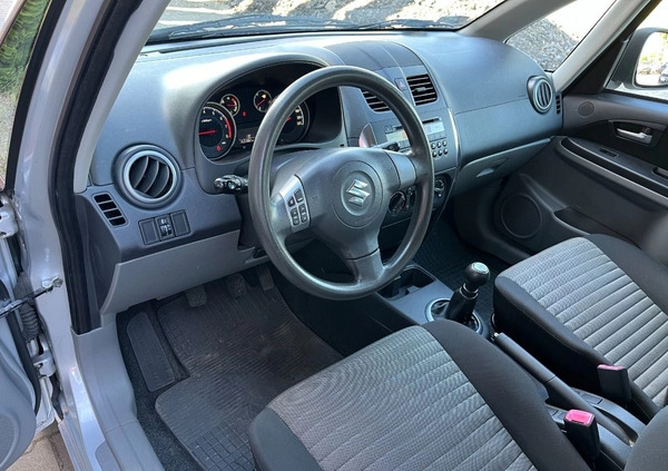 Suzuki SX4 cena 26900 przebieg: 153000, rok produkcji 2012 z Borne Sulinowo małe 254